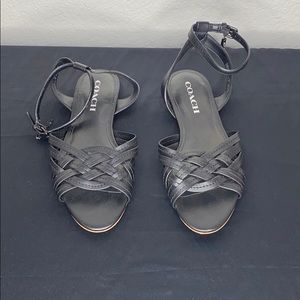 Black leather Coach flat sandals